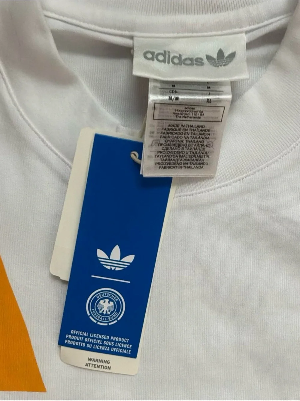 Adidas X German national team 1990’s remake lifestyle graphic tee.
